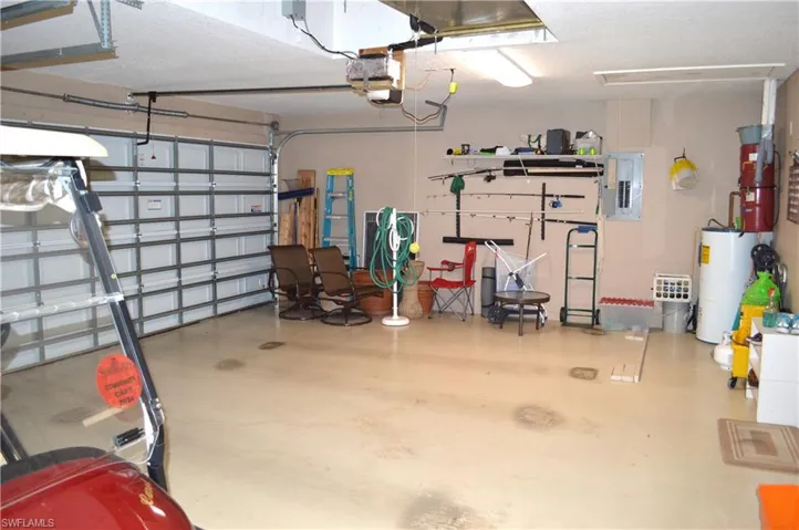 Three car garage with included golf cart