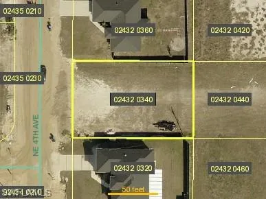 Aerial view of property's location featuring property parcel outlined