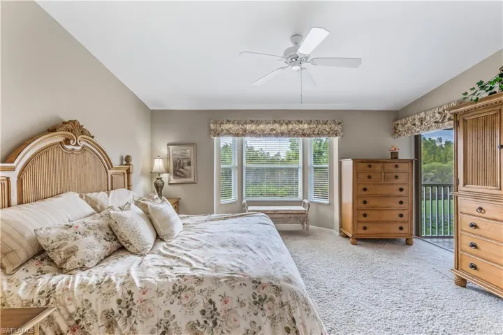Primary with slider to golf course side lanai