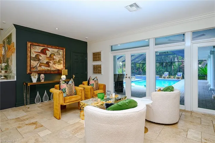 Sitting area in Great Room overlooking Pool