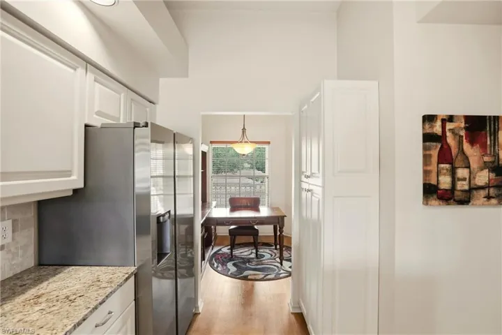 Kitchen featuring storage pantry