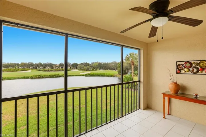 Screened Lanai with a water view and golf course view