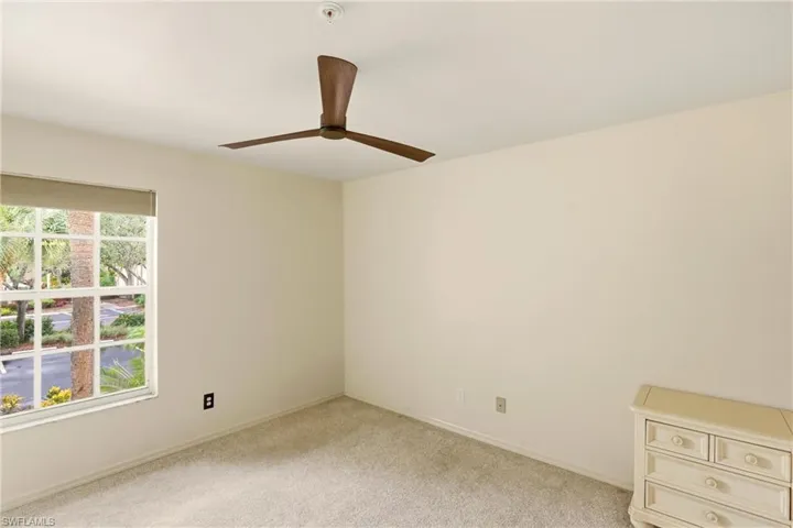 Large guest room accommodates kind bed, nightstands and dressers