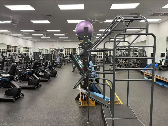 Exercise room featuring a drop ceiling