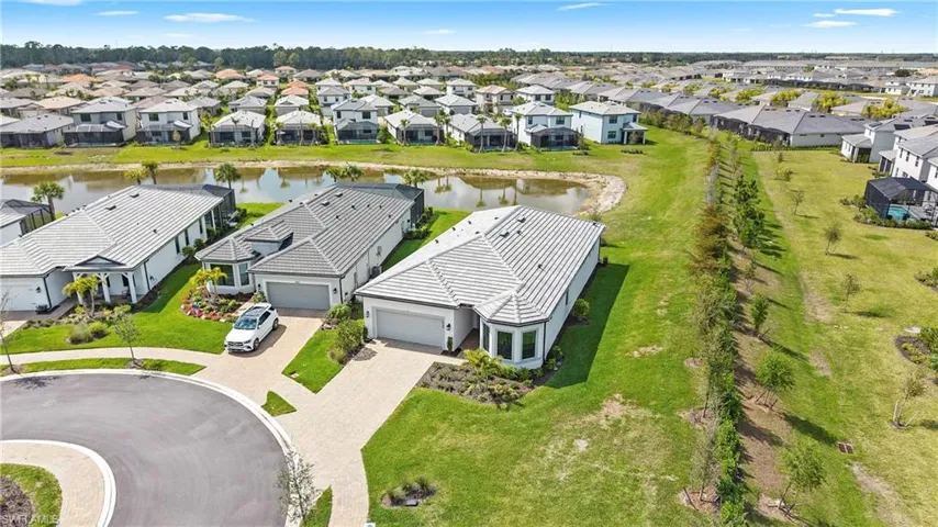 Aerial view of residential area with a nearby body of water