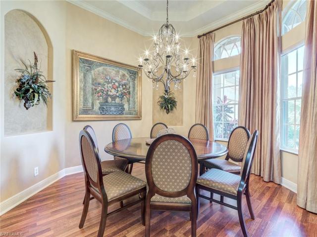 Formal dining area with tray ceiling