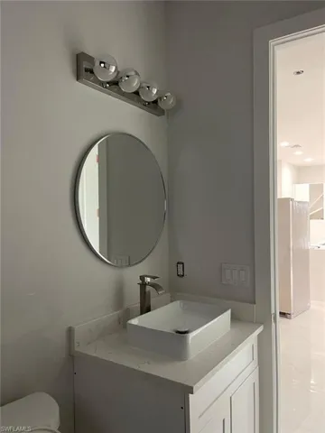 Bathroom featuring toilet and vanity