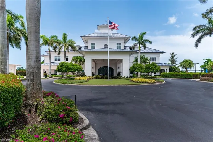 View of building exterior with curved driveway
