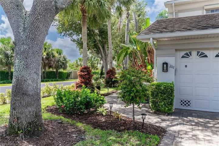View of yard featuring a garage