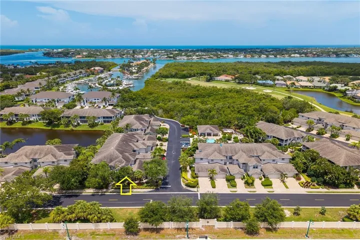 Aerial view of residential area with a nearby body of water