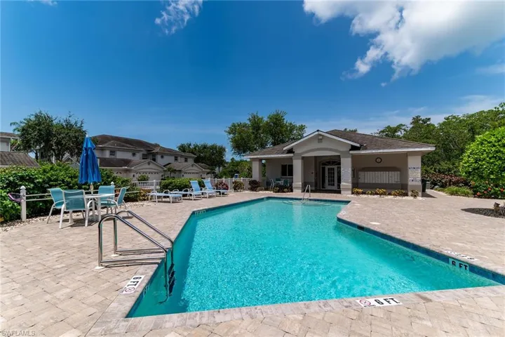 Community pool featuring a patio area
