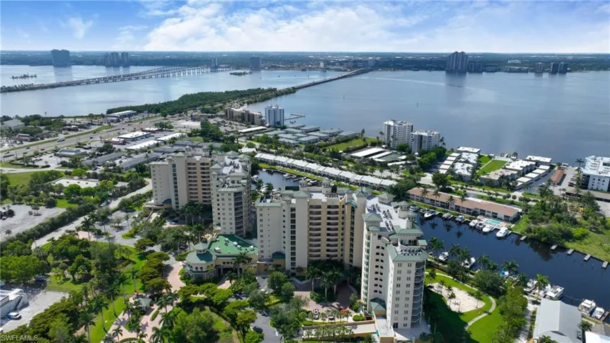 Aerial view of property's location featuring a notable bridge and a nearby body of water