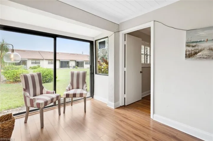 Sunny sitting area at rear of unit.