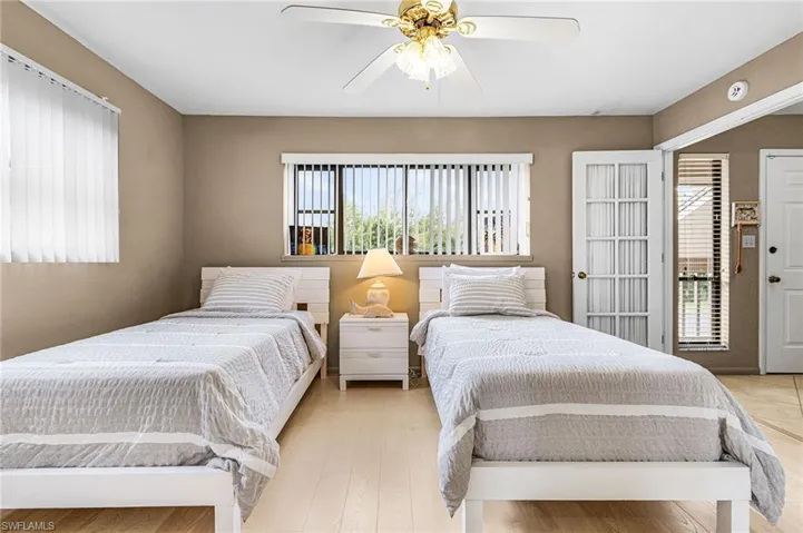 Bedroom featuring a ceiling fan and light wood finished floors