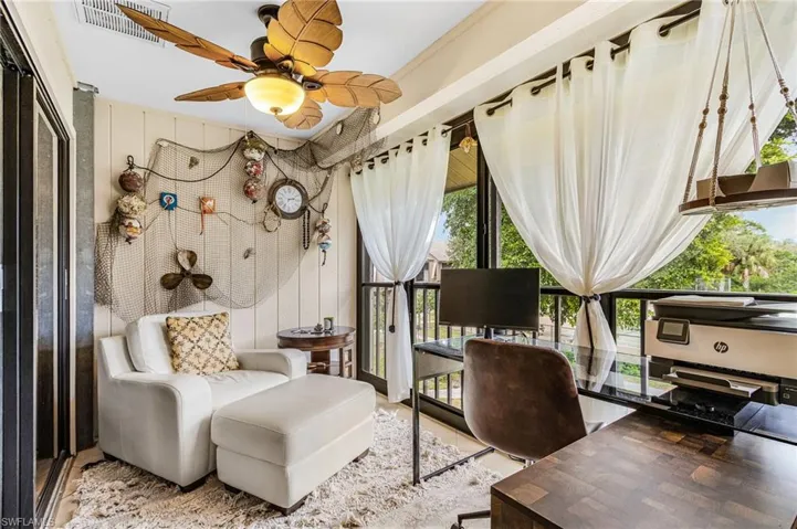 Office area with a ceiling fan