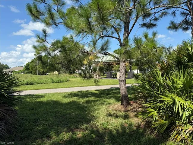View of grassy yard with a gazebo