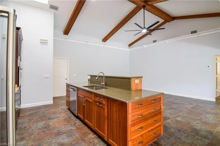 Kitchen island with great storage, deep sink, & dishwasher.