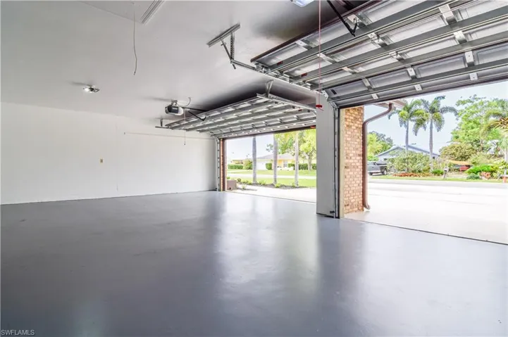 3 bay Garage with a new doors and openers.