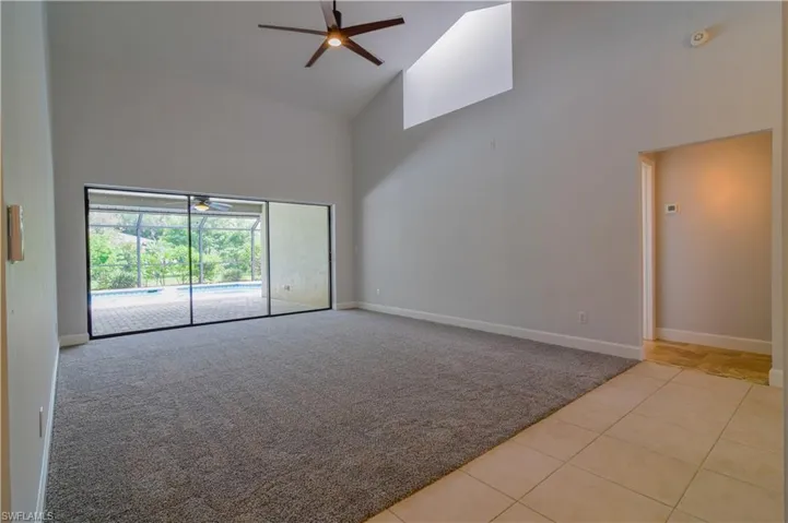 Decorative ledge beneath skylight and triple slider to lanai.