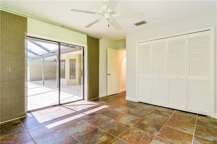 Guest bedroom #2 with the best view of the pool area.