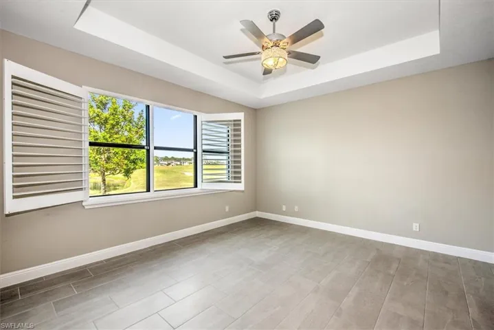 Guest quarters has ceiling fan and a raised ceiling