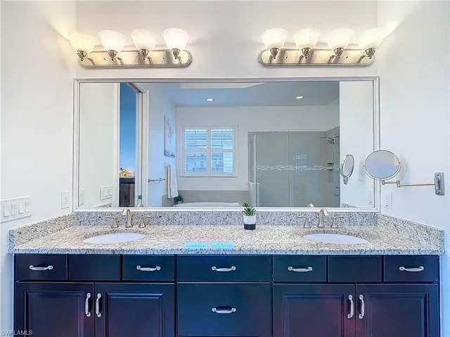 Bathroom with dual bowl vanity