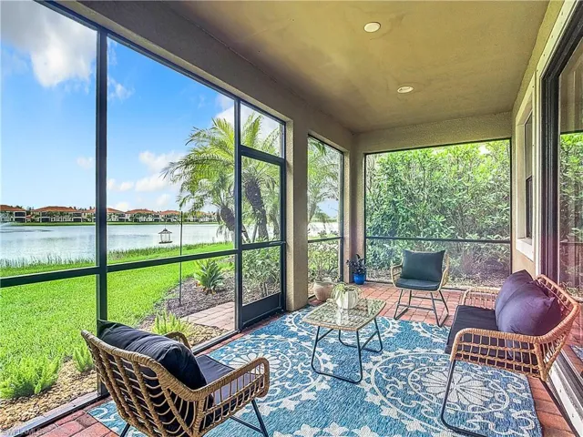 Sunroom with a water view