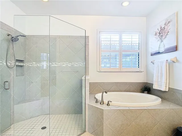 Bathroom with independent shower and bath