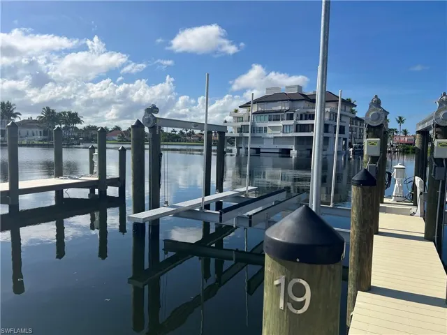 Dock area featuring a water view