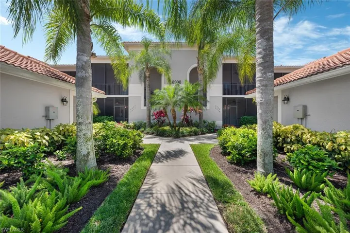 Front entrance with lush landscaping