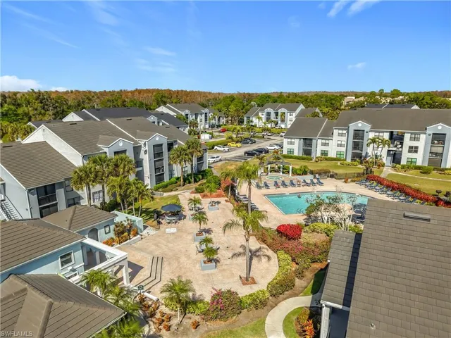 Aerial view of residential area with a pool area