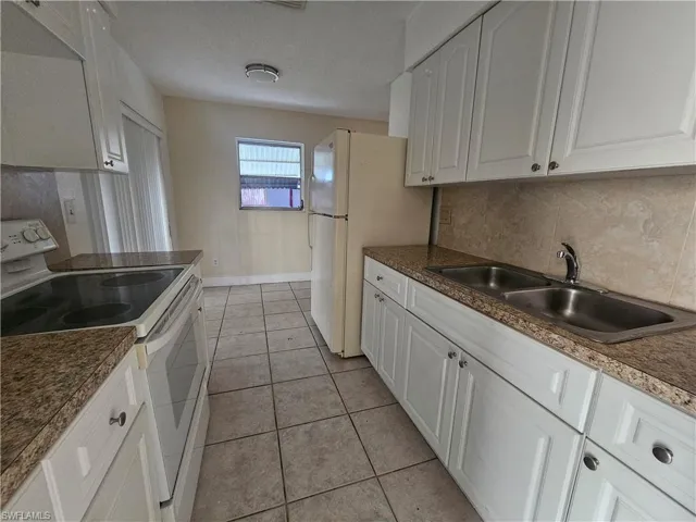 423  Morgan S CIR, Lehigh Acres, FL 33936