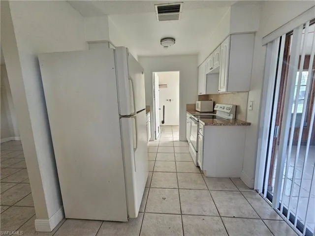 423  Morgan S CIR, Lehigh Acres, FL 33936