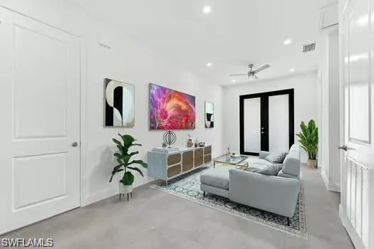 Living area (Virtual Staged) featuring recessed lighting, finished concrete floors, and ceiling fan