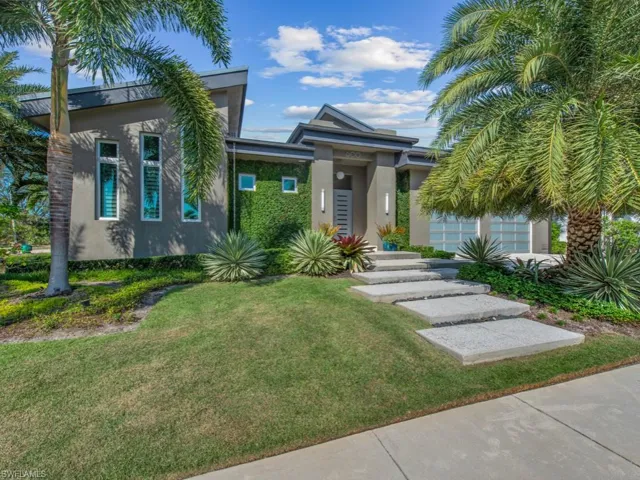 View of front of house with a front yard