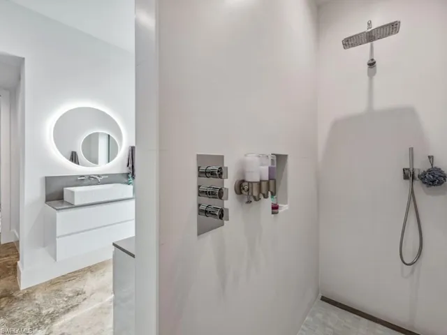 Bathroom with vanity and walk in shower
