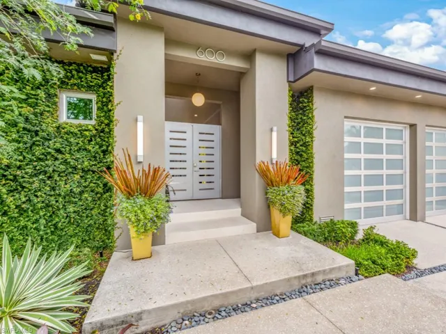 Property entrance featuring a garage