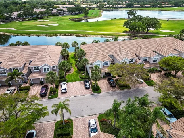 Bird's eye view featuring a residential view, a water view, and golf course view