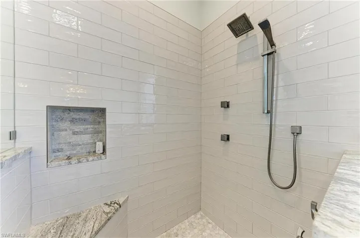 Bathroom with a tile shower