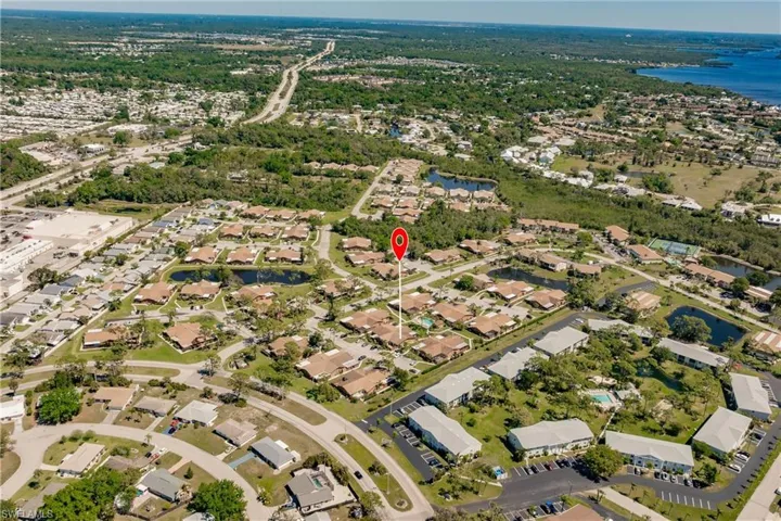 Drone / aerial view featuring a residential view and a water view