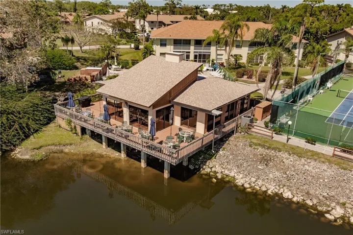 Bird's eye view with a water view and a residential view