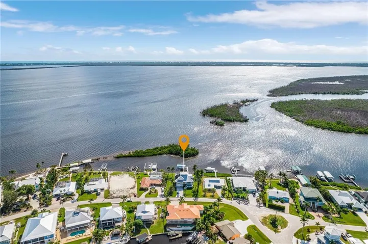 Aerial view of residential area with a nearby body of water