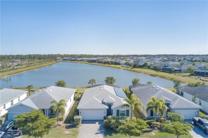 Aerial view of residential area with a large body of water