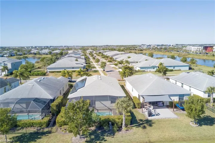 Aerial view of residential area with a large body of water
