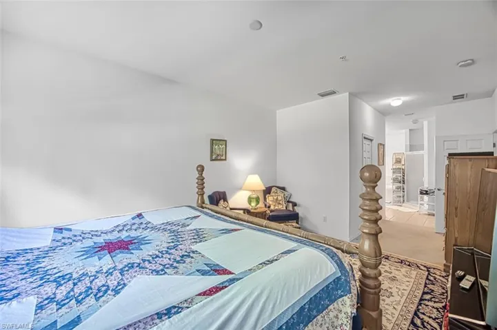 Bedroom with carpet floors and a closet