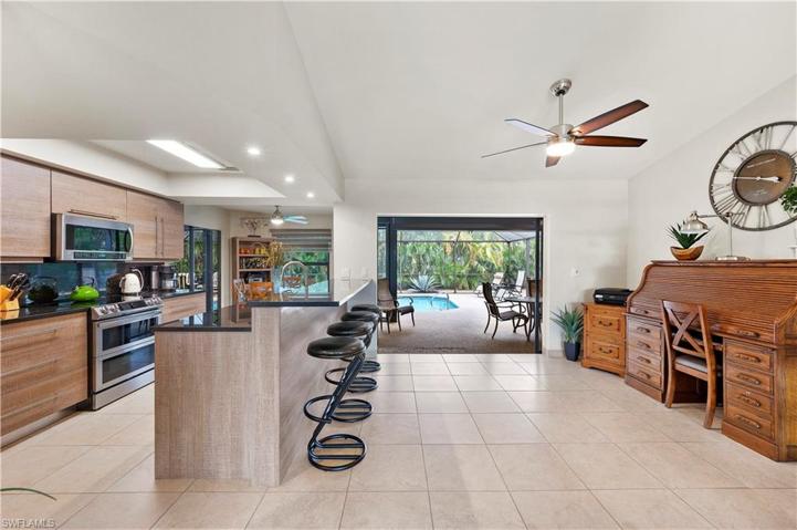Great Room adjacent to Kitchen with disappearing Slider open to Lanai