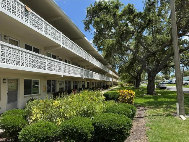 Surrounding community featuring a lawn