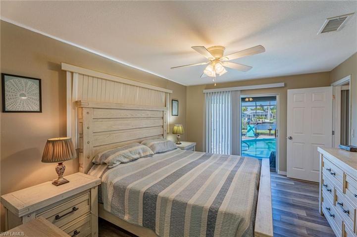Primary Bedroom with access to the pool