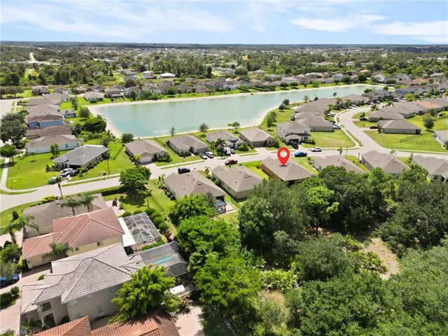 Aerial view of residential area with a large body of water