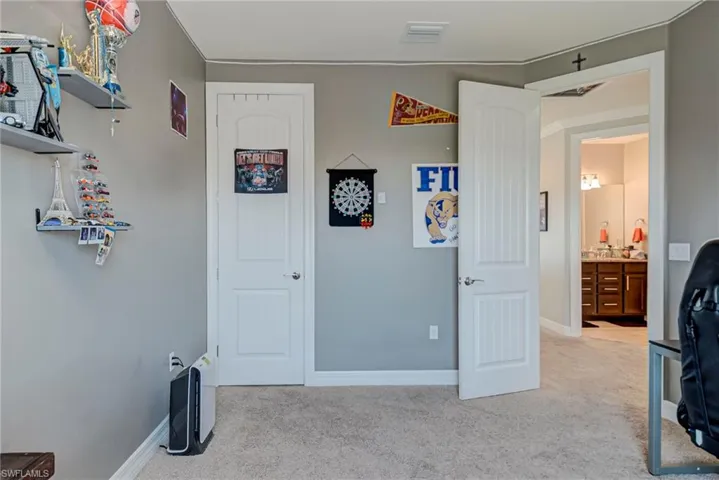 Bedroom featuring carpet